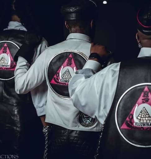 A group of men standing next to each other